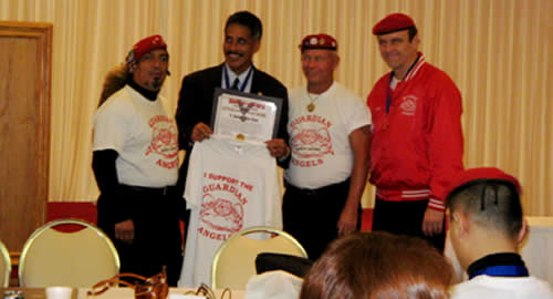 From the left: Ricardo 'Chico' Garcia, Lieutenant Governor James R. 'Duke' Aiona, Jr. 'Rocker' Don Fridinger, and Guardian Angel founder Curtis 'Rock' Silva.