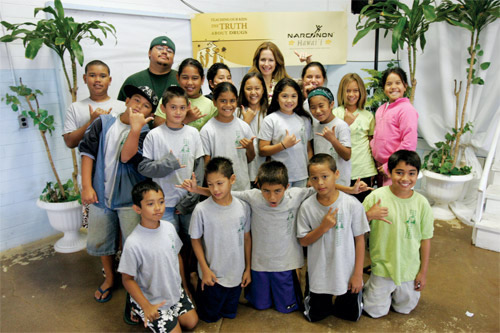 Kelly Preston with students from Waianae Charter School