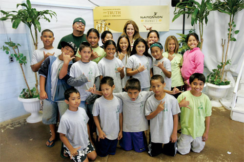 Kelly Preston with students from Waianae Charter School
